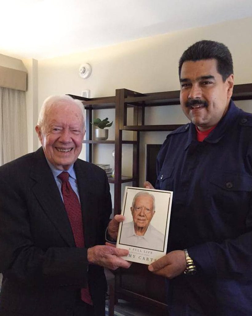 Venezuelan President Nicolás Maduro with the late US President Jimmy Carter.