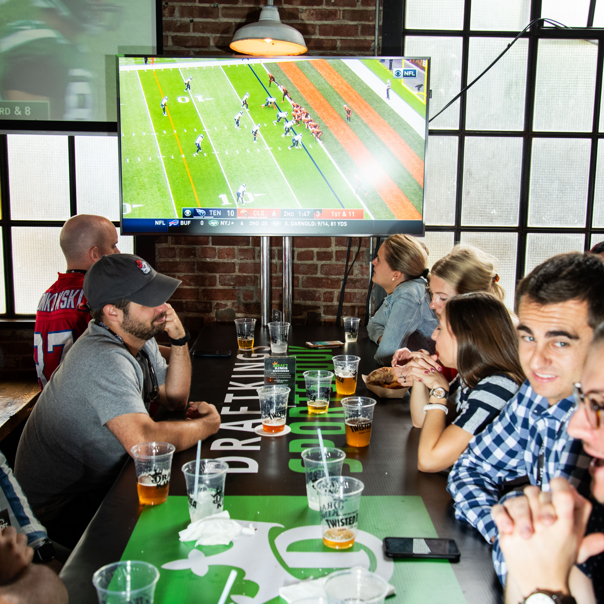 A pop-up party by mobile betting operator DraftKings at a bar near Hoboken Terminal, New Jersey, September 2019.