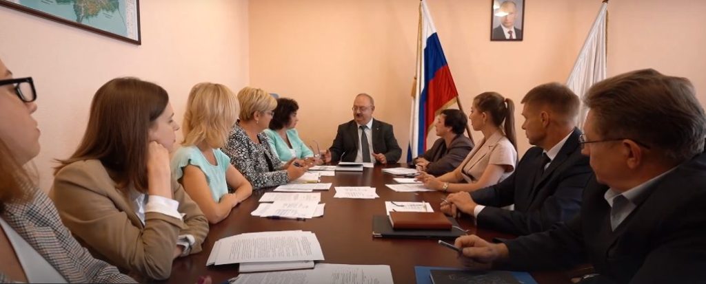 Russian justice ministry officials at a regional-level meeting.