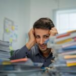 Admin burden costs UK firms £100bn annually as workers waste hours on manual tasks