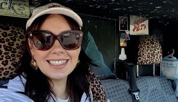 Nicole in her van with her dog Nicole in her van with her dog