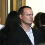 Who Is Eric Saavedra Crypto Mafia Boss Adam Iza’s Corrupt Police Crook